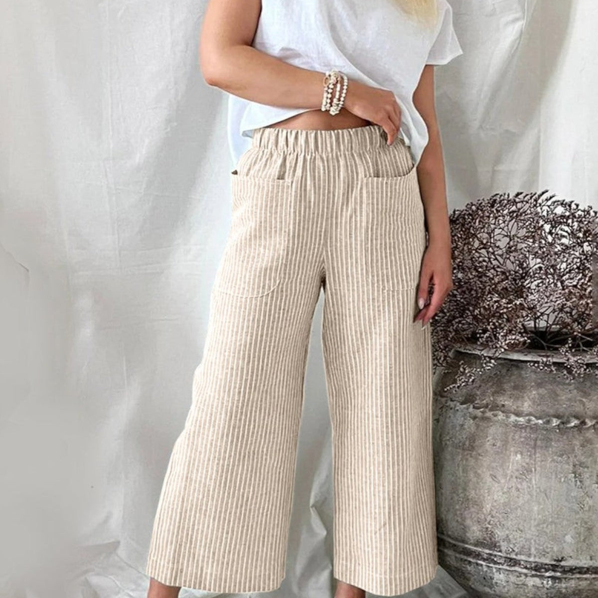 Gestreifte Leinenhose mit hohem Bund und weitem Bein