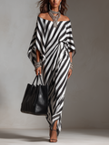 Auffälliges monochromes Streifen-Maxikleid mit asymmetrischem Schnitt