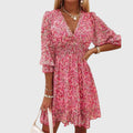 Damen Kleid mit Blumenmuster und Puffärmeln