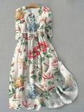Michelle | Bauchschmeichelnde Kleider mit Blumenmuster