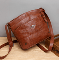 Schultertasche mit reicher Patina und zeitlosem Stil